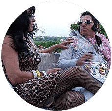 Innkeepers dressed as Elvis and Priscilla